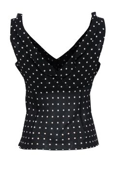 Get some polka dot power with this V-neck tank from Gerard Darel. Made with a ruffled trim, this soft and silky shirt will bring in some playful printed style to any pair of light wash jeans, midi knit skirt and so much more! Size 10 100% Polyester Fitted silhouette V-neckline and back Drawstring waist with ties Waist 30" Total length 23" Polka Dot Sleeveless Party Top, Elegant Polka Dot Party Tops, Elegant Polka Dot Tops For Summer, Fitted Polka Dot Sleeveless Top, Polka Dot Ruffled V-neck Top, Polka Dot V-neck Top With Ruffles, Elegant Sleeveless Polka Dot Top, Elegant Fitted Polka Dot Top, Midi Knit Skirt