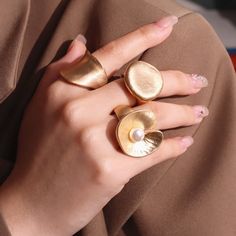 These Chunky Gold Roman Style Rings offer a stylishly sophisticated look that is crafted for a timeless elegance. Their adjustable sizing ensures a comfortable fit to any finger, making them the perfect accessory to elevate any outfit to the next level. Dare to be bold and make a statement with these chic rings. ﻿BUY 2 & 2nd Item 50% Off. Add to cart to automatically apply discount at the check out. Gender: WOMEN Item Type: Rings Shape\pattern: Irregular Metals Type: Titanium Steel Material: Met Chic Rings, Roman Style, Roman Fashion, Spaghetti Strap Mini Dress, Ring Shapes, Wedding Dress Shopping, Be Bold, Shape Pattern, Steel Material