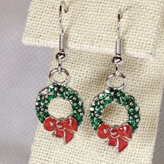 Christmas, Holiday, Hypoallergenic, Wreath Drop Earrings,  Enamel Green and Red Wreath, Surgical Steel, Hypoallergenic Earrings  *Perfect Holiday Jewelry to show your Christmas Spirit, also makes the Pefect Stocking Stuffer!* (imited supply) Enameled Holiday Wreath Drop Earrings Each piece is shipped in an organza drawstring bag and mailed in a bubble mailer to arrive safely from my studio to your door! Thank you for shopping Rustic Midwest Charm, and have a wonderful day! Red Wreath, Jewelry Holiday, Holiday Earrings, Holiday Earring, Holiday Wreath, Stocking Stuffer Gifts, Bubble Mailer, Holiday Jewelry, Hypoallergenic Earrings