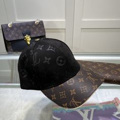 SHOP MORE LUXURY PRODUCTS HERE Description Louis Vuitton LV Get Ready Cap Monogram Black LV Cap Sports-inspired style meets impeccable craftsmanship in the LV Get Ready Cap. This easy-to-wear piece is defined by an eye-catching visor crafted from durable Monogram coated canvas. Contrast piping around the edges is a subtle nod to the House’s expertise in goods. The design is finished with an adjustable strap for a custom fit. BlackMonogram coated canvasAdjustable strap at backDry clean only Designer Streetwear Cap, Designer Adjustable Black Baseball Cap, Designer Baseball Cap For Streetwear, Luxury Visor Baseball Cap For Streetwear, Designer Black Baseball Cap With Curved Brim, Luxury Baseball Cap For Streetwear With Visor, Luxury Streetwear Baseball Cap, Luxury Snapback Baseball Cap, Designer Black Baseball Cap