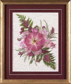 a painting of pink flowers in a gold frame