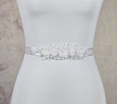 A really great belt for a wedding dress in white, decorated with pearls, lace, sequins and flowers made of satin ribbon and organza ribbon. The motif is 21 cm long and 4.5 cm wide in the middle. The bridal belt is 2.5 cm wide and a total length of 2.5 m. The belt comes in a gift box for better storage. Lace Belt, Wedding Sash Belt, Wedding Belts, A Wedding Dress, Bridal Belt, Organza Ribbon, Satin Ribbon, Wedding Accessories, White Dress