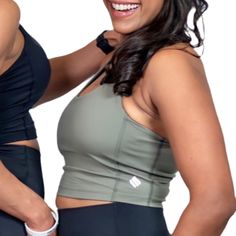 Every MPowHer piece is thoughtfully designed to solve issues in women's activewear, one seam at a time! One of our Best Sellers: MPowHer's Super Soft Racerback Crop offers both support and style. Featuring a built-in bra with high-quality, removable pads, this crop provides a seamless, luxurious look and feel. Made from buttery-soft fabric, it's perfect for wearing on its own or layering with your favorite tee or tank. The versatile racerback design makes it ideal for everything from workouts to 4-way Stretch Activewear With Built-in Bra For Training, Activewear With Built-in Bra And 4-way Stretch For Training, Casual Activewear With Built-in Padding And Supportive Fit, Versatile Green Activewear For Gym, Supportive Activewear With Built-in Padding, Supportive Functional Tops With Built-in Padding, Squat Proof Green Activewear For Yoga, Supportive Racerback Activewear With 4-way Stretch, Supportive 4-way Stretch Racerback Activewear