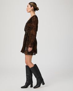 This drapey dress is crafted in a cheetah printed velvet burnout silk blend perfect for any special occasion this season. We love all the feminine details of this long sleeve faux-wrap mini dress, like the shirring at the front waist and shoulder and ruffles at the cuff and hemline. | Ysabel Dress - Landslide Multi Velvet | Size 2 Drapey Dress, Printed Velvet, Velvet Burnout, Feminine Details, Men Store, Denim Shoes, Mini Wrap Dress, Cheetah Print, Ruffles