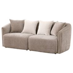 a beige couch with pillows on top of it