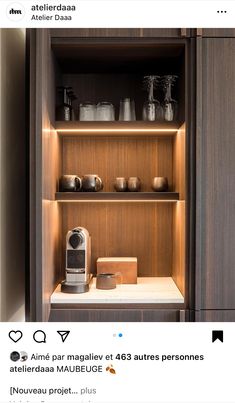 an image of a shelf with coffee cups and other items