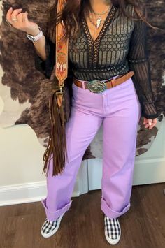 Our Raven Vintage Jeans are a straight VIBE!! High waisted light lavender color non stretch wide leg Rock these jeans to stand out from the crowd. Sporting a straight VIBE with a high waist and wide leg, they're perfect for adding a pop of lavender to any look. Waist size: (Small) 27.6 inch; (Medium) 29.1 inch; (Large) 31.5 inch Purple Western Outfit, Weekend In Nashville, Ashley White, Fringe Crossbody Bag, Purple Jeans, Light Lavender, Cowgirl Western, Coastal Cowgirl, Inspired Outfits