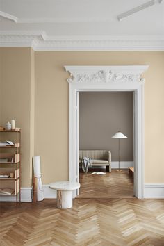 a living room filled with furniture and wooden floors