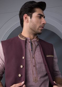 Waist Coat : Embroidered waistcoat in a deep maroon hue to layer over black shalwar kameez, for a perfect festive look. Details : Straight Front with Embellished band Plain Back, Band Neckline. Color : Maroon. Fabric : Melange winter fabric. Country of Origin : PakistanCare Instruction : Should be washed in gentle cycle and hung to dry. Color may bleed so please be mindful of other items with it.Disclaimer : Actual sizes might be slightly different from the size chart. Unstitched Nehru Jacket For Festive Winter Occasions, Semi-formal Traditional Wear With Resham Embroidery, Bollywood Style Formal Outerwear For Eid, Semi-formal Resham Embroidery Kurta For Eid, Semi-formal Embroidered Traditional Wear, Semi-formal Embroidered Bandhgala For Eid, Semi-formal Nehru Jacket With Resham Embroidery For Diwali, Embroidered Nehru Jacket For Eid And Semi-formal Occasions, Embroidered Nehru Jacket For Semi-formal Eid Occasions