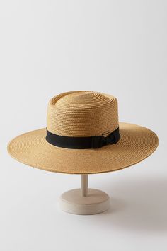 Trust this styled gaucho to keep the season cool. Paper braid shades you with UPF 50 sun protection, beautiful texture, and a 4" brim. And it's finished with a grosgrain ribbon and bow, and an inner drawstring that gives you a comfort fit. 80% Paper Braid, 20% Polyester. Classic Summer Sun Hat With Visor, Classic Wide Brim Sun Hat With Upf 50+, Adjustable Straw Boater Hat For Picnic, Classic Panama Visor Hat For Summer, Classic Visor Panama Hat For Summer, Adjustable Straw Boater Hat For Picnics, Upf 50+ Curved Brim Boater Hat For Kentucky Derby, Classic Sun Hat With Uv Protection And Wide Brim, Classic Wide Brim Sun Hat With Uv Protection