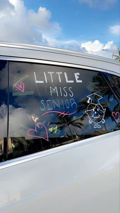 the back window of a car with writing on it that says, little miss senior