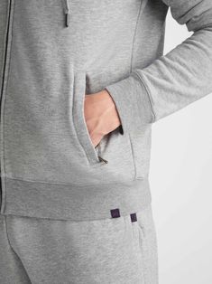 Our Quinn hoodie in silver is stylish, yet practical. Featuring zipped front pockets with welts and with ribbed cuffs and neck trim, this hoodie is designed to hold its shape wash after wash. The Quinn fabric combines all the key qualities of our cotton and micro modal; it's durable and has great colour retention, meaning it can withstand long-lasting wear and this classic silver colour won't fade. It's thermoregulating, making it perfect for warm days or cosy evenings in and it's breathable, so Sporty Hooded Jacket With Ribbed Cuffs For Loungewear, Gray Hooded Jacket With Double-lined Hood For Loungewear, Hooded Sweatshirt With Ribbed Collar For Loungewear, Casual Long Sleeve Hoodie With Zip Cuffs, Derek Rose, Hoodies Mens, Silver Colour, Silver Man, Free Shopping