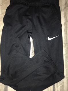 NIKE DRI-FIT Jogging Pants YOUTH LARGE Black W/Pockets White SWOOSH. Condition is "Pre-owned". Shipped with USPS Priority Mail. Nike Sweatpants For Sports Season Streetwear, Nike Sweatpants With Side Pockets For Sports, Sportswear Sweatpants With Side Pockets For Training, Nike Sportswear Activewear With Side Pockets, Nike Activewear With Side Pockets, Nike Activewear With Pockets For Training, Sportswear Joggers With Pockets For Sports Season, Sporty Joggers With Pockets For Training, Sporty Sweatpants With Pockets For Training