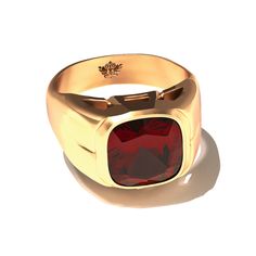 Part of the Resort Collection, the Grand Touring Ring is a statement of refined adventure and sophistication. Cast in solid gold and crowned with a deep red garnet, this signet ring captures the essence of timeless luxury. The rich hue of the garnet evokes the allure of far-flung destinations and the warmth of sunset-lit landscapes. Designed for the discerning traveler who seeks both elegance and character, this ring pairs classic signet styling with a modern flair. The Grand Touring Ring is mor Timeless Formal Signet Ring With Gemstone, Timeless Gemstone Signet Ring For Formal Events, Timeless Gemstone Signet Ring For Formal Occasions, Timeless Polished Birthstone Ring For Formal Occasions, Timeless Formal Birthstone Ring With Polished Finish, Gold Garnet Birthstone Ring, Timeless Red Jewelry For Formal Occasions, Luxury Ruby Signet Ring For Formal Occasions, Luxury Polished Finish Ruby Ring For Formal Occasions