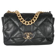 Listing Title: Chanel Black Shiny Lambskin Chanel 19 Flap Bag SKU: 133402 MSRP: 6400.00 USD Condition: Pre-owned Condition Description: A timeless classic that never goes out of style, the flap bag from Chanel dates back to 1955 and has seen a number of updates. The design was revolutionary for its time, giving its wearers the freedom to carry their everyday must-haves without the cumbersome nature of a larger bag. The bag features the classic leather-entwined chain-link shoulder strap for a dis Chanel 19 Flap Bag, Chanel 19, Davao, Red Handbag, Chanel Model, Black Exterior, Chanel Black, Large Bag, Classic Leather