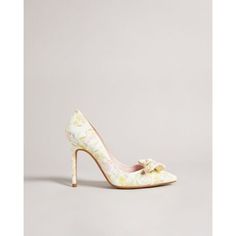 With A Playful Magnolia Print And A Bow Embellishment, The Neomah Court Shoes Are Perfect For The Season Ahead. Slip Them On For The Office Or With Denim For Brunch You Can Never Go Wrong With A Classic Pair Of Heels. Court Shoes Sketchy Magnolia Print Bow Embellishment Closed Pointed Toe Slip On Heel Height: 10cm Yellow Round Toe Heels For Wedding, Yellow Almond Toe Court Shoes For Formal Occasions, Yellow Court Shoes For Spring Formal Occasions, Yellow Court Shoes For Spring Formal Events, Yellow Heels For Summer Wedding, Yellow Summer Heels For Wedding, Elegant Yellow Court Shoes For Spring, Yellow Summer Wedding Heels, Yellow Pointed Toe Court Shoes For Formal Occasions