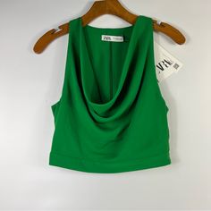 Brand New With Tag. Absolutely Gorgeous Top By Zara! It Features A Pretty Emerald Color, A Flowy Draped Neckline, Cropped Length, Back Hidden Zipper Closure. 100% Polyester. Zara Fitted Green Crop Top, Fitted Green Zara Tops, Zara Green Cropped Top, Zara Ruffle Top, Black Silk Blouse, Denim Corset Top, White Crop Tank, Lace Corset Top, Satin Crop Top