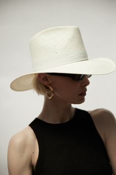 Design A classic fedora style made with packable straw. The structured fit creates a beautiful modern shape while staying true to the timeless design of our classic fedora. This effortless piece can easily be worn year-round and is meant for traveling with you wherever you go. Material Our most innovative design yet- a packable straw, that feels and looks like our Panama Straw. We created this straw with an incredibly durable fiber at its core. You can roll and pack it for up to 1 day and it wil Women Fedora, Packable Hat, Janessa Leone, Classic Hats, Denim Shoes, Dress Hats, Summer Hats, Straw Hat, Leather Band