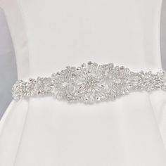 a bridal belt with crystal stones on it