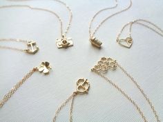 Clover Necklace In Gold Lucky Charm Irish Luck Shamrock Necklace Irish Wedding Bridesmaid Everyday Jewelry, Modern, Minimalist by AnechkasJewelry on Etsy https://www.etsy.com/listing/152462275/clover-necklace-in-gold-lucky-charm  pretzel & Clover are my faves xoxo Mummsie Anchor Heart, Honeycomb Necklace, Four Leaf Clover Necklace, Anchor Pendant, Celtic Wedding Rings, Minimal Necklace, Clover Necklace, Girl Jewelry, Necklace Minimalist