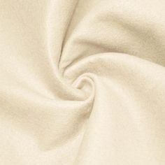 a close up view of a white fabric textured with light colored yarn or polyester