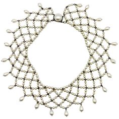 A truly beautiful, timeless Vintage Louis Rousselet Collar created in Paris. Crafted in silver tone metal and glass pearls. Featuring a lacey style collar of beautiful lustrous, most likely poured glass pearls, including round and teardrop and finished with the signature Rousselet button clasp. In very good vintage condition. Signed 'France' as expected for Rousselet pieces. The pearls are in exceptionally good condition for the age. Approx. 37cms with a 5cm depth. A remarkable find that will al Pearl Lace, Pearl And Lace, Lace Fashion, Vintage Jewellery, Vintage Stil, French Vintage, Style Vintage, Givenchy, Yves Saint Laurent