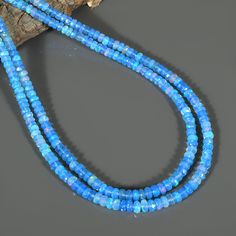 Ethiopian Blue Opal Layering Necklace Shape- Rondelle Faceted Size- 4-5.5mm Length- 47CM,50Cm Metal- Pure 925 Sterling Silver Ethiopian opal necklace-Blue opal necklace-Welo fire Ethiopian opal necklace-AAA opal beaded necklace-Multi fire blue opal necklace-gift set Bulk wholesale pricing is available All of my jewelry is designed and handcrafted by me. I love to experiment with many different designs and although I may make similar designs more than once, each piece of jewelry is truly one of a Opal Gifts, Fire Blue, Ethiopian Opal Necklace, Fire Opals Jewelry, Blue Opal Necklace, Opal Wedding, Jewelry Statement, October Birthstone, Welo Opal