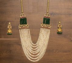 *It's Handmade Gold Plated Indian Kundan Jewelry Necklace and Earrings Set. *It's 22 K Gold Plated made from Silver and Copper Mix material and also using hand cut stones like shown in picture. *It's beautiful Ethnic Indian Wedding Long Ranihaar Necklace with Green Enameled and Statement Earrings. *It's Earrings are 2.5 Inch Long with Jumkhi. *Necklace and Earrings are same like shown in picture. *It will come with adjustable string which fits all Neck size. *Our all jewelry is made from semipre Sabyasachi Jewellery, Kundan Jewelry, Necklace Indian, Antique Jewelry Indian, Indian Jewelry Sets, Bollywood Jewelry, Gold Fashion Necklace, Gold Jewellery Design Necklaces, Indian Wedding Jewelry