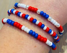 The Beadbound Jewellery💜 patriotic bracelet set is a fun piece of beaded jewellery for a red, white and blue celebration 🇬🇧 🇺🇸 🇦🇺 . Made by hand, the set includes a combination of 3 bracelets made from red, white and blue seed beads.  The beads are threaded on to elastic string so the bracelets will stretch to fit your wrist, but while care is taken to secure the beads, please don't overstretch them to avoid damage. Please choose your bracelet size when ordering. Due to the bracelet being made with small beads it is not recommended for children younger than 3 years. I provide FREE UK 2nd class  delivery (estimated delivery 2-4 days from posting). Tracked international shipping is also available via Royal Mail. All orders come in an organza pouch. Thank you for looking at Beadbound J Patriotic Red Beaded Bracelets With Round Beads, Red Round Beads Bracelets For 4th Of July, Patriotic Red Beaded Bracelet With Round Beads, Patriotic Red Beaded Bracelet, Red Beaded Bracelets For 4th Of July, Beaded Bracelet For 4th Of July, Adjustable Colorful Beaded Jewelry For 4th Of July, Adjustable Friendship Bracelets For 4th Of July, Multicolor Round Beads Bracelet For 4th Of July