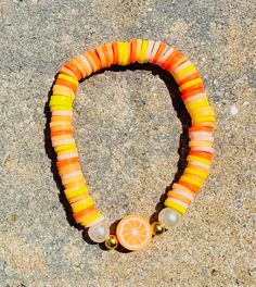 This bracelet is super adorable and fun because it has a cute orange charm on it Fruit Bracelet, Flemington Nj, Beauty Book, Jewelry Bracelets, Accessory Gift, Charm Bracelet, Beaded Bracelets, Ships, Electronic Accessories