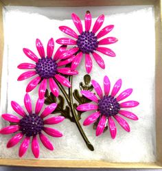 Vintage hot pink and purple enamel brooch & matching clip on earrings. Small loss of enamel on top of one stem of brooch,  see last photo. See all photos for size and condition.  Feel free to ask any questions. Pink Flower Enamel Brooch, Vintage Pink Enamel Pin Gift, Pink Flower Enamel Pin, Vintage Pink Enamel Pin, Vintage Pink Enamel Brooches, Enamel Flowers, Enamel Brooch, Earrings Small, Enamel Flower