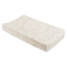 an image of a mattress that is made out of white and beige fabric with a pattern on