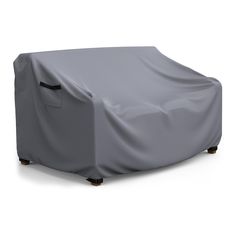 an outdoor furniture cover on top of a table