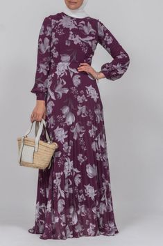 Elevate your everyday style with our Everyday casual modest high neck pleated maxi dress in ditsy floral print. The purple hue adds a touch of luxury to this versatile piece, perfect for any casual occasion. Stay comfortable and chic with its flowy silhouette and intricate pleat detailing. Indulge in the world of modest fashion with our Everyday casual DESIGN high neck pleated maxi dress in ditsy floral print in purple. The delicate pleats and flowy silhouette exude elegance, while the purple hu Chic Purple Maxi Dress, Modest Pleated Maxi Dress, Flowy Purple Maxi Dress For Fall, Spring Mauve Maxi Dress With Floral Print, Casual Purple Floral Print Maxi Dress, Chic Purple Floral Print Maxi Dress, Feminine Purple Long Sleeve Maxi Dress, Flowy Purple Maxi Dress, Purple Floral Print Maxi Dress