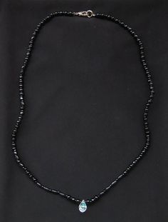 Black Bead Necklace with Crystal 18" This cute, simple necklace is made of black beads and a single teardrop shaped crystal. The silver clasp works perfectly. Measures 18". Black Oval Beaded Necklaces, Black Teardrop Jewelry With Faceted Beads, Black Jewelry With Faceted Oval Beads, Black Teardrop-shaped Jewelry With Faceted Beads, Black Jewelry With Oval Faceted Beads, Black Adjustable Teardrop Pendant Necklace, Black Beaded Necklaces With Lobster Clasp, Black Beaded Necklaces With Heart-shaped Beads, Black Beaded Necklaces With Heart And Round Beads