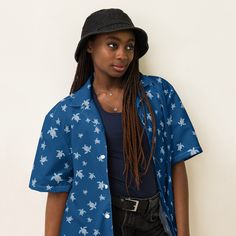 Discover the Ultimate Summer Wardrobe Essential: The All-Over Print Collared Unisex Button-Down Shirt! 🌟 👕 **Ultra-Comfortable & Stylish Dive into summer with flair in our All-Over Print Collared Unisex Button-Down Shirt. Designed to impress and built for comfort, this shirt is your perfect companion for every summer adventure. With a blend of 65% recycled polyester and 35% polyester, it offers a sustainable choice without compromising on style. 🌞 **Beat the Heat Say goodbye to discomfort on Blue Collared Camp Shirt For Beach Season, Collared Camp Shirt With Buttons For Beach, Printed Button-up Camp Shirt For Beach, Blue Hawaiian Shirt With Hibiscus Print For Beach, Casual Collared Top With Hibiscus Print, Collared Tops With All Over Print For Vacation, Blue Hibiscus Print Shirt For Beach, Casual Buttoned Camp Shirt For Beach, Blue Collared Blouse For The Beach