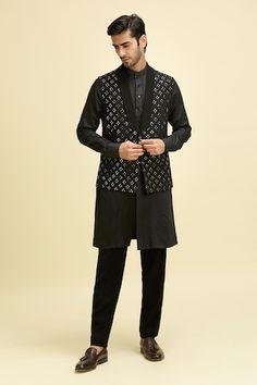 Black nehru jacket with geometric mirror embroidery and shawl collar. Paired with a kurta and pant. - Aza Fashions Designer Nehru Jacket With Mirror Work For Festive Season, Designer Nehru Jacket With Mirror Work For Diwali, Formal Nehru Jacket With Mirror Work, Designer Black Nehru Jacket With Chikankari Embroidery, Elegant Nehru Jacket With Mirror Work For Transitional Season, Fitted Designer Outerwear With Mirror Work, Transitional Black Nehru Jacket For Ceremonial Occasions, Black Nehru Jacket For Ceremonial Transitional Events, Transitional Ceremonial Black Nehru Jacket