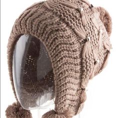 Metal Studded Pom Knit Hat With Ear Flaps Brand New - Comes In Several Colors So Don’t Forget To Check Out Our Other Listings. Tan Color Adjustable Knit Crochet Hat For Winter, Adjustable Knit Crochet Winter Hat, Winter Adjustable Bonnet In Acrylic Yarn, Casual Knitted Hat With Ear Flaps, Warm Beige Acrylic Hats, Casual Beige Acrylic Hat, Adjustable Beige Beanie For Winter, Beige Acrylic Hat, One Size Fits Most, Beige Acrylic Beanie Hat