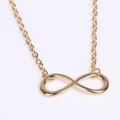 What better way to accessorize your beachwear than the Gold Infinity Hip Chain? The Infinity Hip chain is a great way to add that extra bling to your summer fun. Material: Gold plated alloy. Nickel free. Size: 24mm x 19mm Length: 37 inch with 3 1/2 inch extension Comes in a gift box. Reg $28.99 Summer Metal Chain Necklace With Adjustable Chain, Summer Chain Necklace With Adjustable Metal Chain, Gold Alloy Beach Jewelry, Gold Alloy Jewelry For Beach, Trendy Summer Alloy Jewelry, Gold Infinity Shaped Metal Jewelry, Trendy Alloy Beach Jewelry, Gold Metal Necklace For Summer, Metal Infinity Jewelry With Adjustable Chain