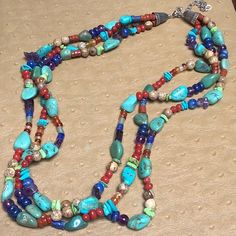 Beautiful Mixed Gemstone Necklace! Three Strands Of Various Sizes And Shapes Of Gemstones. Gemstones Include: Turquoise, Amethyst, Lapis, Jasper, Carnelian. End Caps Are 925 Silver As Is Extender. Measures 20 Inches With 3 Inches Of Extender. Gorgeous! Gorgeous! Never Worn. Excellent Condition. Smoke/Pet Free Environment. Turquoise Jewelry Set, Three Strand Necklace, Southwest Jewelry, Navajo Jewelry, Southwestern Jewelry, Party Foods, 925 Jewelry, Strand Necklace, Turquoise Jewelry