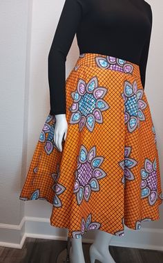 Ankara Skirt for women, African skirt  Circle skirt  Back zipper  Side pockets  Lined  30 inches long  100% Cotton Long Fitted Pleated Skirt With Pockets, Fitted Long Pleated Skirt With Pockets, Fitted Flared Skirt With Side Pockets, Stretch Skirt With Side Pockets, Knee-length Skirt With Side Pockets, Orange Full Maxi Skirt With Lined Skirt, Orange Skirt Bottoms With Pockets, Multicolor Relaxed Skirt With Pockets, Stretch Orange Lined Skirt