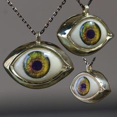 Glass Eye Pendant, Green Big Eye Pendant, Evil Eye Talisman Pendant, Glass Green Eye Necklace, Evil Eye Necklace, Eye Jewelry, Gift Idea My eye designs can be made specifically for your eyes, you need to take a beautiful iris photo for us. Then we can customize it for you. You can also add or remove blood details to our eye designs. You can write this in the order notes. Please send me a message after ordering. I can do as you wish. A quasi-universal symbol of protection, the evil eye is referre Luxury Jewelry Box, Talisman Pendant, Glass Eyes, Eye Design, Evil Eye Necklace, Eye Necklace, Eye Jewelry, Big Eyes, Green Eyes