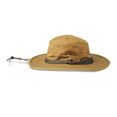 Our most durable hat has an extra-wide brim for sun protection, ventilating grommets, a cotton sweatband for breathable comfort and an adjustable leather chin strap. The hat is water repellent and wind and wear resistant. Outdoor Hats Men, Bush Hat, Filson Mens, Adventure Hat, Womens Luggage, Shooting Accessories, Outdoor Hats, Fishing Outfits, Water Repellent Fabric