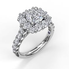 a diamond ring with two rows of diamonds on the band and a center stone surrounded by smaller round stones