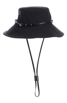 A wider-than-average brim and an adjustable chin strap add extra coverage, a secure fit and easy transport to this bucket hat from Givenchy's Voyou collection. Drawcord-adjustable chin strap 100% cotton Dry clean Made in Italy Adjustable Fit Flat Brim Bucket Hat For Travel, Adjustable Flat Brim Bucket Hat For Travel, Adjustable Fit Travel Bucket Hat With Flat Brim, Adjustable Bucket Hat With Short Brim For Travel, Black Adjustable Bucket Hat With Short Brim, Black Adjustable Short Brim Bucket Hat, Adjustable Black Bucket Hat With Short Brim, Adjustable Brimmed Bucket Hat For Travel, Adjustable Fit Black Brimmed Sun Hat