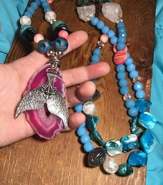 Huge! Long! Blue quartz, pink agate, jade, crystal, swinging hand wrapped mermaid tail, bohemian statement necklace, mala, art, boho, shell by designmefab on Etsy https://www.etsy.com/listing/713109079/huge-long-blue-quartz-pink-agate-jade Blue Festival Jewelry Ocean-inspired, Bohemian Mermaid Necklace For Gifts, Bohemian Mermaid Necklace Gift, Blue Ocean-inspired Jewelry For Festivals, Blue Ocean-inspired Festival Jewelry, Silver Mermaid Tail, Blue Quartz Crystal, Geode Necklace, Quartz Pink