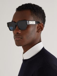 Dior Eyewear's 'CD SU' sunglasses have sharp square frames that are defined by the oversized silver-tone logo plaque at the arms. They've been made in Italy from glossy black acetate and are fitted with blue lenses. Store yours in the case between wears to prevent scratches. Ray Bands, Dior Eyewear, Sunglasses Dior, Boys Sunglasses, Men Dior, Dior Sunglasses, Blue Lenses, Black Boys, Square Frame