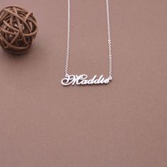 "CHRISTMAS GIFT-NAME Necklace-Personalized name plate necklace-Custom silver name jewelry for women,bestfriend This Personalized name necklace is one of the most special and personal pieces of jewelry you can own or give as a gift. Your purchase will arrive inside a lovely gift box ready for gift giving. Product Description Metal&Chain:Sterling Silver Color: silver, gold, rose gold Pendant Width: 20mm-40mm (according to the length of the names,its size is not fixed) Thickness : 1.2 mm. (appr Nameplate Necklaces As Birthday Gift, Personalized White Name Necklace For Mom, Customizable Letter Name Necklace, Custom Nameplate Necklace For Mother's Day, Nameplate Necklace With Names For Mother's Day, Customized Nameplate Necklace For Birthday Gift, Customized Nameplate Necklace For Birthday, Silver Name Necklace For Personalized Gift, Custom Name Letter Necklace For Birthday Gift