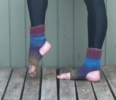 These hand knit socks are perfect for yoga, Pilates or dance class.  They will keep your feet and ankles warm, but leave your toes and heels open to grab the mat or floor.  Perfect gift for your favorite yogi or dance teacher.  Wear them with flip flops to show off your pedicure.   Made from a soft and warm yarn of 100% acrylic in tweed stipes in shades of red, turquoise,  purple and gold.  Approximately 9" in length.  Machine wash warm, tumble dry low.  You may also hand wash and dry flat.    NOTE THAT COLOR MAY VARY SLIGHTLY DUE TO PHOTOGRAPHIC LIGHT SOURCES OR YOUR MONITOR SETTINGS. Please read shop  polices before making purchase. Pedicure Socks, Teacher Wear, Dance Socks, Flip Flop Socks, Pilates Socks, Hand Knit Socks, Yoga Socks, Dance Teacher, Red Turquoise