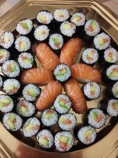 sushi platter with several different types of sushi